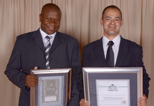 Mr.RetselisitsoeMaliehe (Ibhayi Contracting) and Mr. Phillip Ronné (BKS). Mr.RetselisitsoeMaliehe (Ibhayi Contracting) and Mr. Phillip Ronné (BKS).
